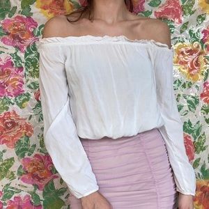 all white long sleeved shoulder shirt